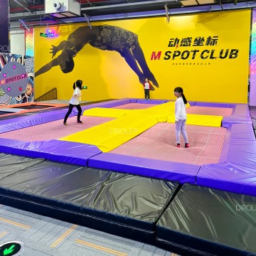 High-rated playground supplier sells Morandi custom playgrounds pre-installed with ninja course, safety climbing panels and soft trampolines.