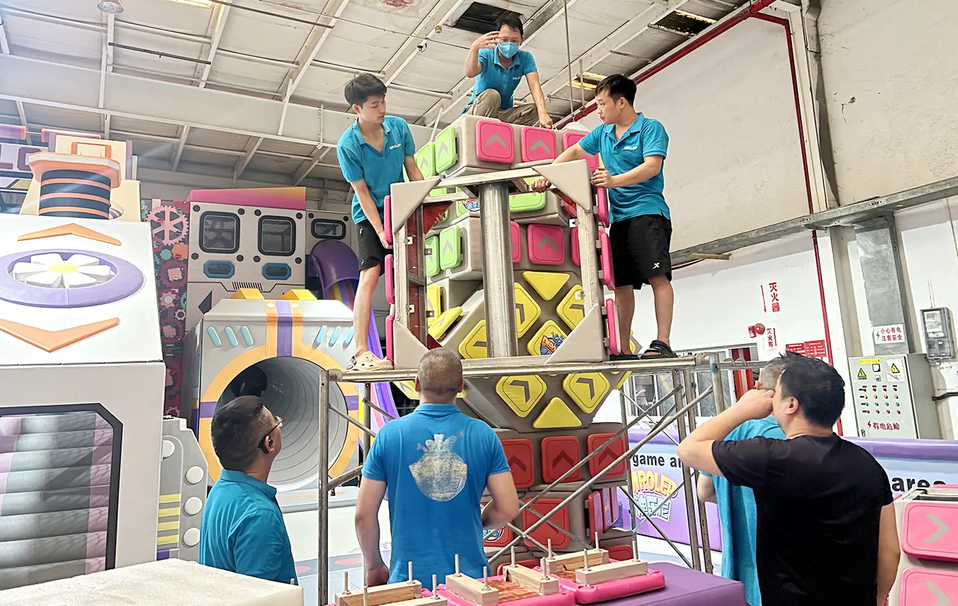 Creating age-appropriate trendy play areas, the Dirolep park exhibition hall's new trampoline and rock climbing equipment makes its debut