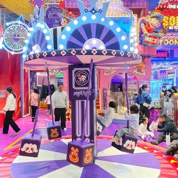 Large minimalist Morandi indoor playground with commercial trampolines, racing slides, climbing walls and full ninja course from direct factory.
